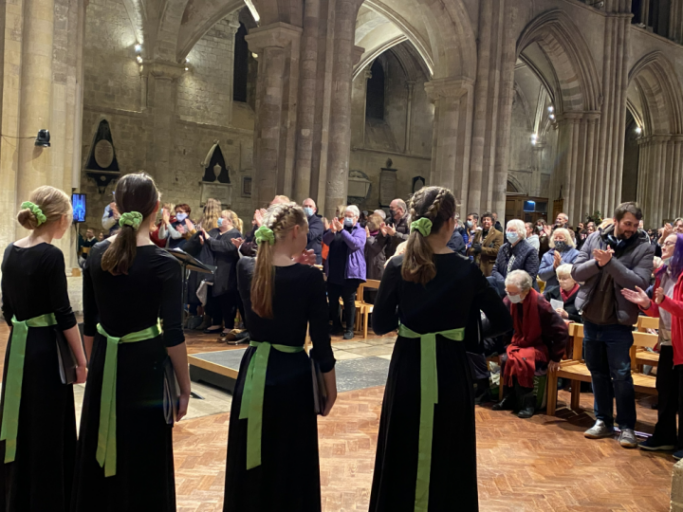 A standing ovation following a performance.