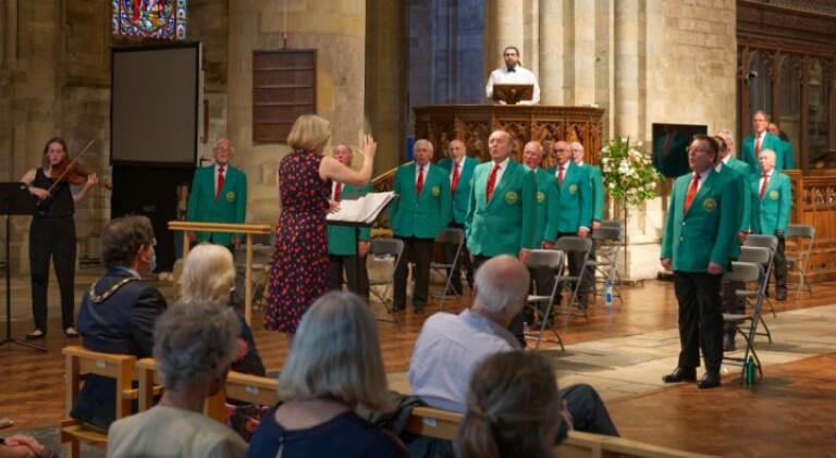 Marion's conducting brings us and the music to life.