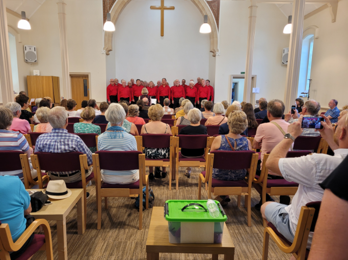 A full church - so good of them in the heat.