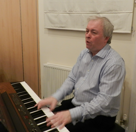 Brian Budden leading the Christmas sing-song.