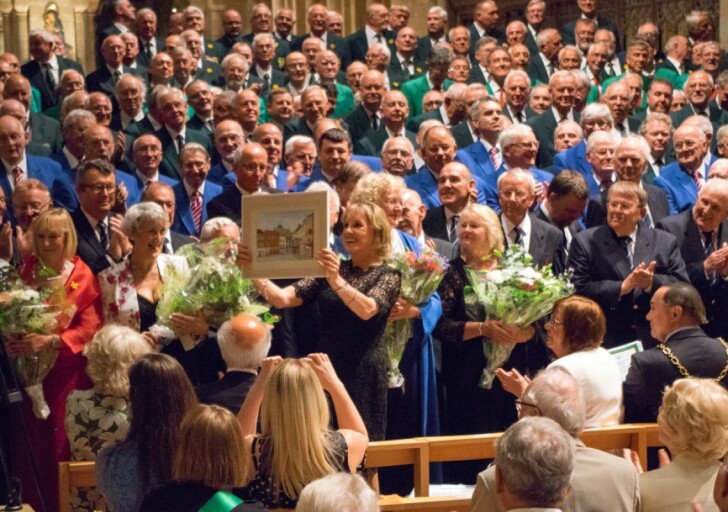 2017 Massed Choirs Hosted by Dame Esther Rantzen - just a little thank you to her with one of RMVC's Peter Larkin's paintings.