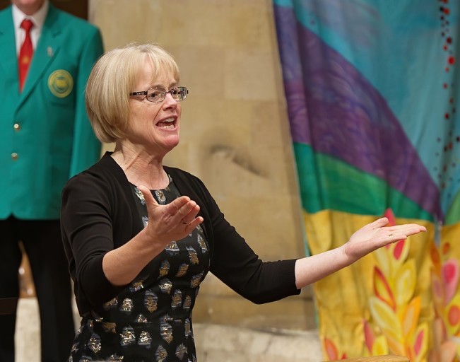 Marion conducting the audience in Sweet Caroline