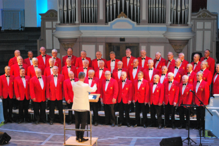 Kidderminster Male Choir in their striking red jackets.