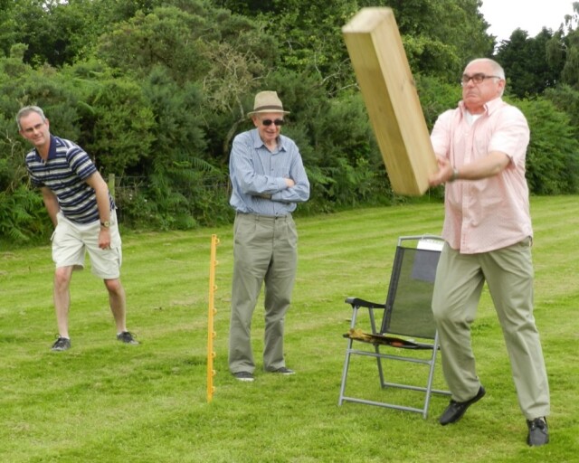 Tossing the mini caber. Jack in action - and yes it was heavy!