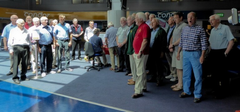 Singing Bui Doi in the Ferry Terminal in Jersey.